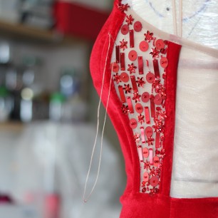 Red velvet strapless floor length bustier evening dress with train