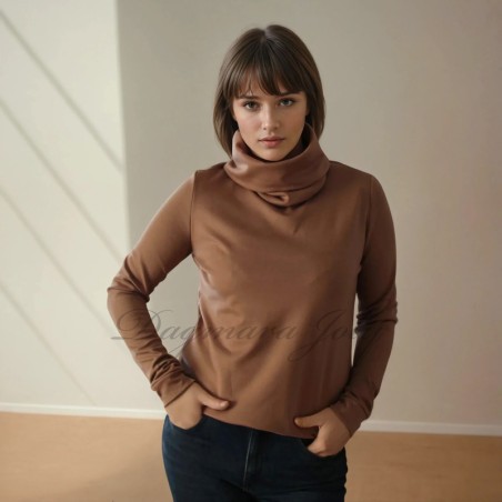 Model is wearing handmade brown jersey turtleneck blouse