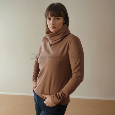 Model is wearing handmade brown jersey knit turtleneck blouse