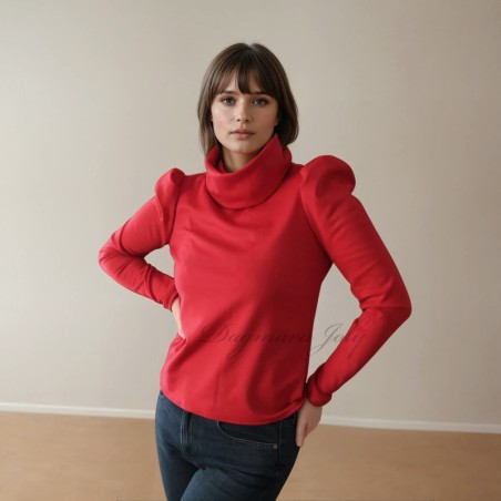 Model is wearing handmade red jersey high neck blouse with puff sleeves