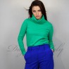 Model is wearing Milano Jersey Turtleneck Blouse with long sleeves made to measure