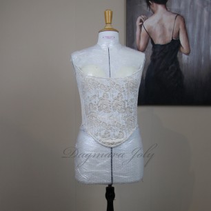 Gros plan du tissu en brocart une texture raffinées.