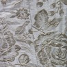 Close-up of the luxurious Victorian brocade fabric showing texture.