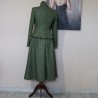 Bespoke green tweed women’s skirt suit with a fitted and subtly flared silhouette