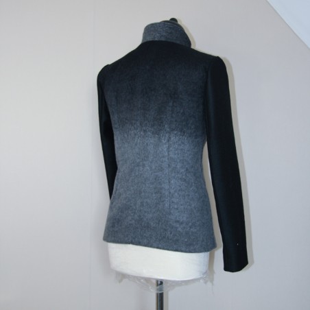 Back view showing structure of the fitted jacket