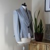 Side view of fit and flared gray shawl collar blazer made to measure
