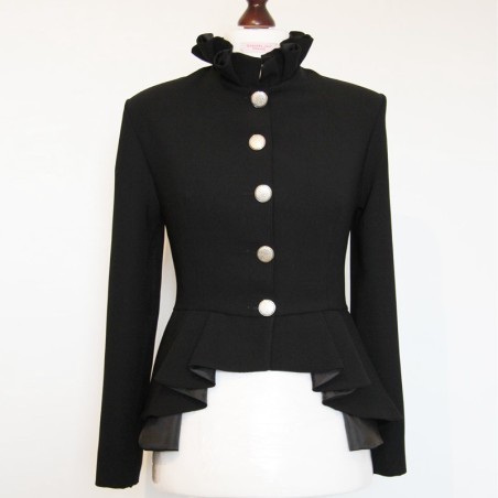 Close-up of pleated collar detail on asymmetrical peplum jacket