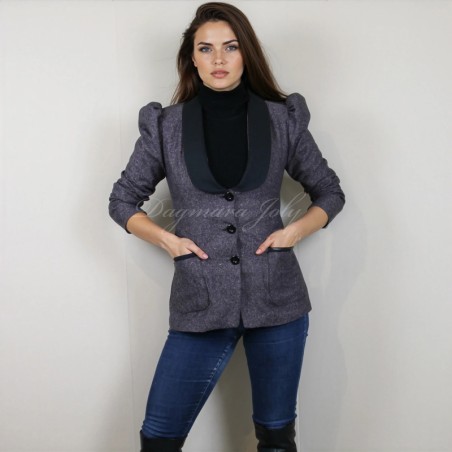 Elegant tweed jacket styled with jeans and long boots