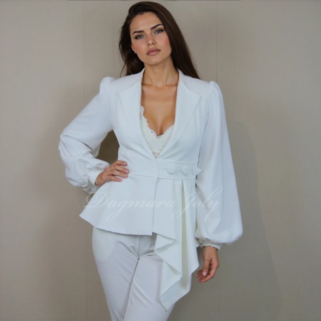 Detail of asymmetrical pleated peplum in motion