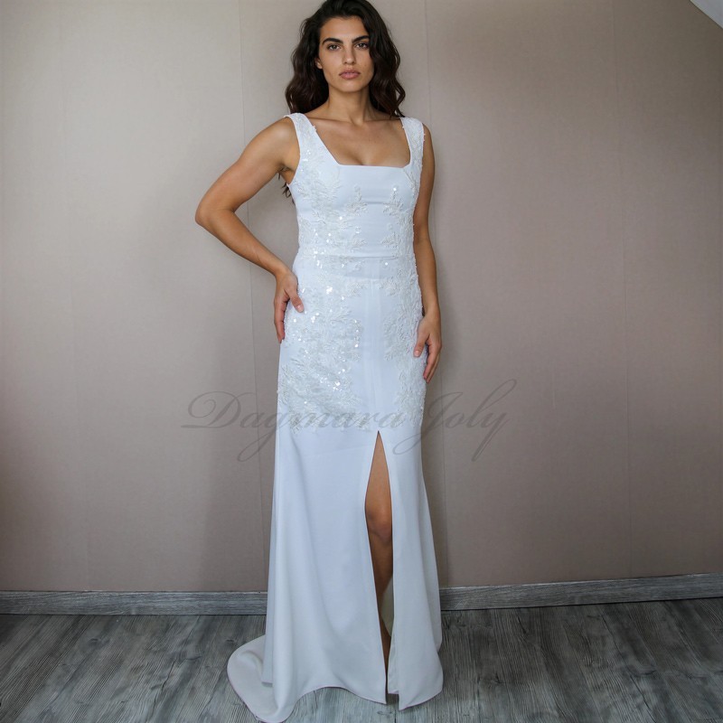 Full front view of wedding dress with short back train, front slit and square neckline