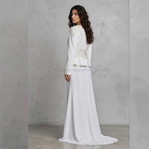 vue arrière du tailleur de mariage jupe peplum, mettant en valeur les broderies et détails cristallins