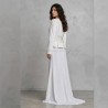 vue arrière du tailleur de mariage jupe peplum, mettant en valeur les broderies et détails cristallins