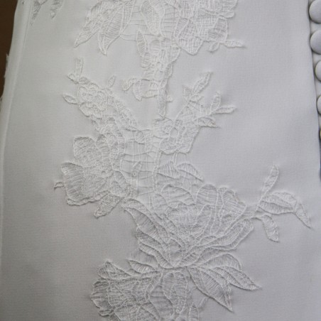 Back lace and button detailing on a handmade French wedding dress