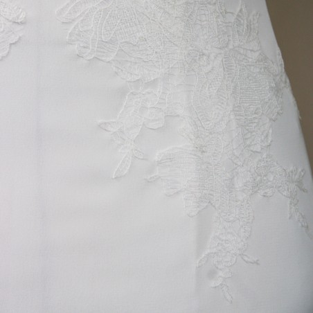 bACK detail of a clean and elegant crepe wedding dress