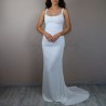 Bridal model wearing a minimalist handmade wedding dress made in France
