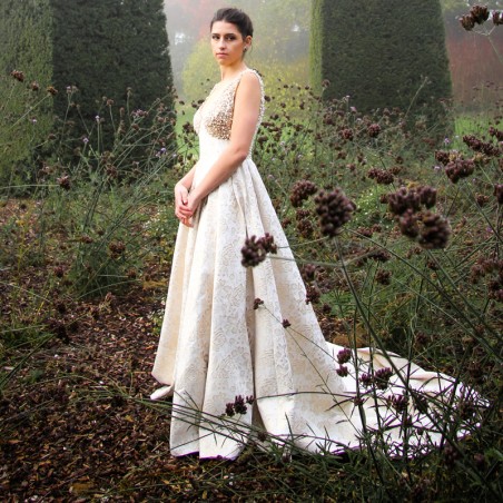 Sleeveless A line bridal gown with pearls and sequins and train