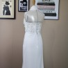 Close-up of a fabric on the back of this modest wedding dress