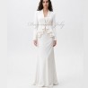 Wedding ensemble with asymmetrical pleated peplum blazer and floor-length skirt