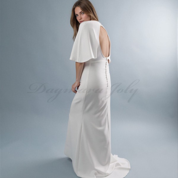 Mariée portant une robe de mariage minimaliste faite main en France