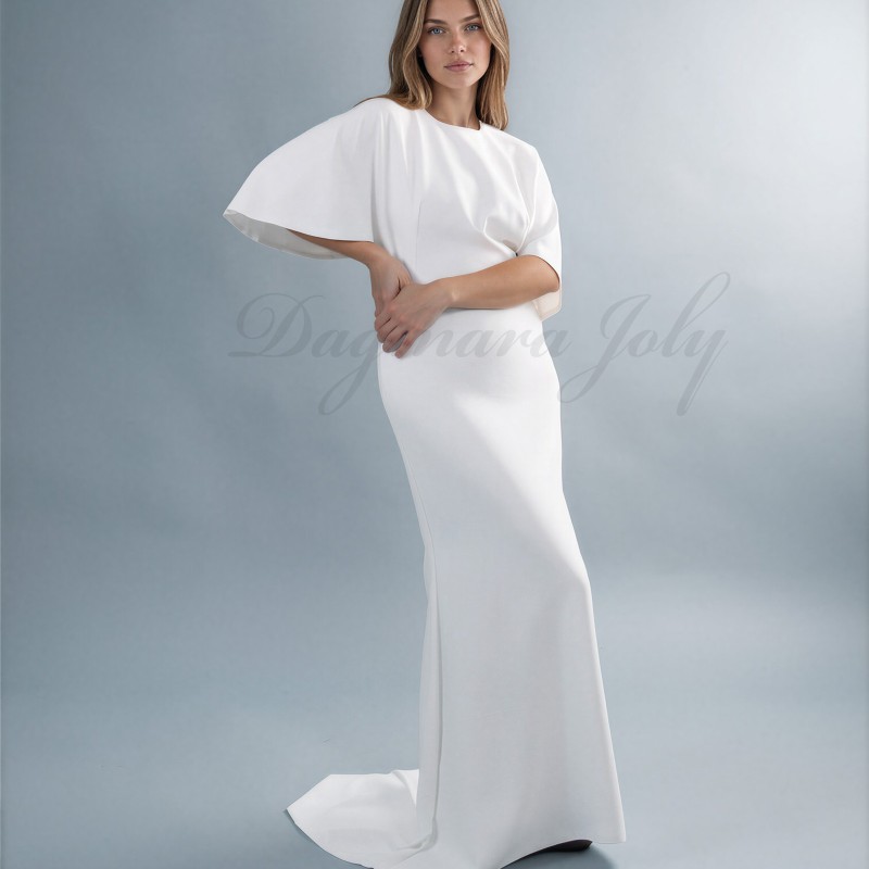 Vue devant d’une robe de mariée sur mesure en crêpe fluide à la silhouette allongée