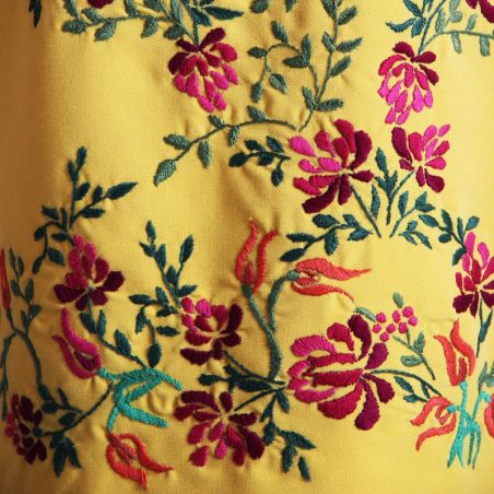 Close-up of hand embroidery on pencil midi dress