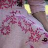 Detail of stitching on hand-embroidered linen dress