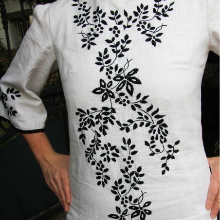 White short hand embroidered linen open back dress