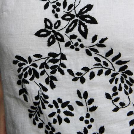 White short hand embroidered linen open back dress