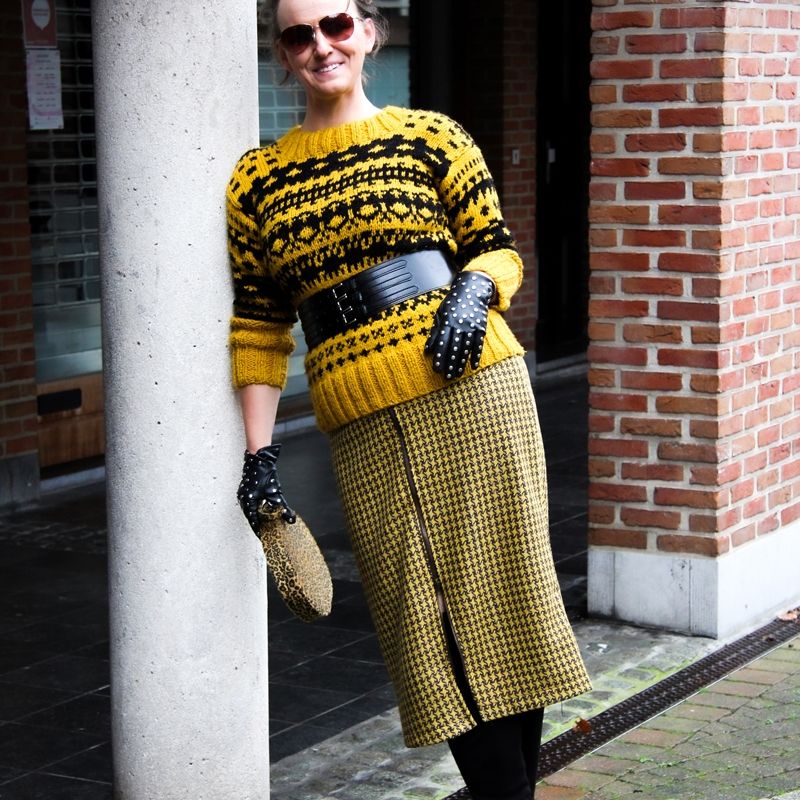 Knitted mustard sweater in a nordique style