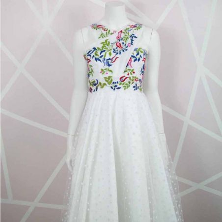 White tulle , cross front, midi length, hand embroidered dress, with U scoop back. One of a kind, made in France.