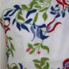 Zoom on hand embroidered floral motif on the lin on this wedding sleeveless dress