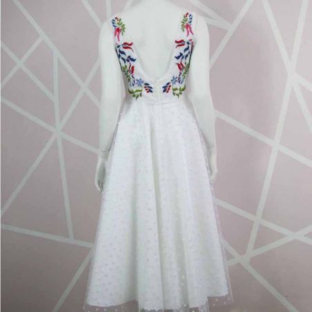 White tulle , cross front, midi length, hand embroidered dress, with U scoop back. One of a kind, made in France.