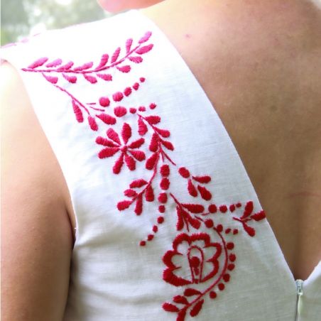 White calf length sleeveless open back tulle wrap dress