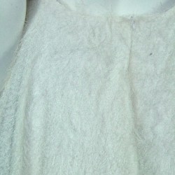 White asymmetrical sleeveless and backless dress