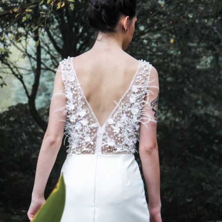 Sleeveless high slit wedding dress with long train and open back