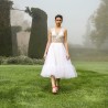 Artistic shot showing the dress in motion, highlighting hand embroidery and elegance