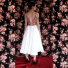 Back full view of White floral sleeveless midi satin dress