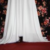 White long asymmetrical sleeveless U scoop back dress