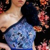 Zoomed-in detail of velvet texture and intricate stitching