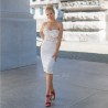 Front view of short strapless wedding dress with pearl, crystal, and floral embellishments – handmade in France