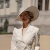 Detailed shot of couture embroidery on a luxurious bridal jacket