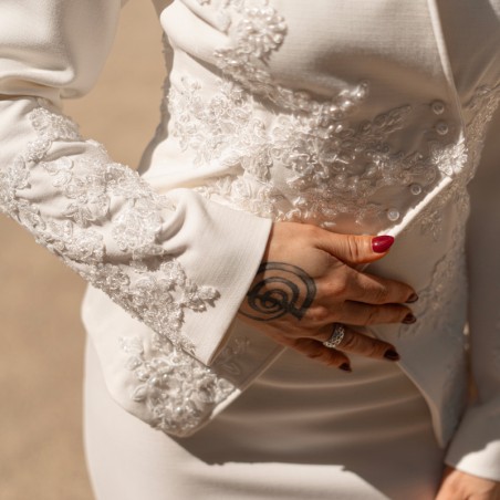 Close-up of handcrafted embellishments on a made-to-measure wedding jacket