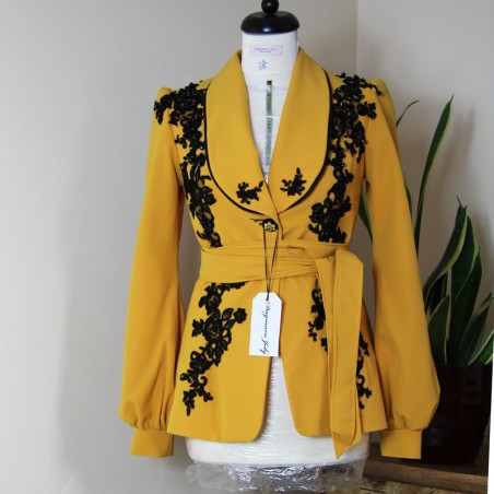 Mustard shawl collar jacket with black lace and bead embellishments – front view