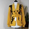 Mustard shawl collar jacket with black lace and bead embellishments – front view Mustard shawl collar jacket with black lace and bead embellishments – front view