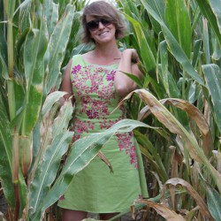 Linen short sleeveless green dress , floral design, hand embroidered.